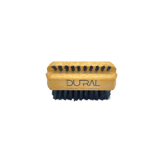 Dural beech wood travel-size hand and nail brush by Pasteur Pharmacy with natural bristles for grooming and cleaning nails.