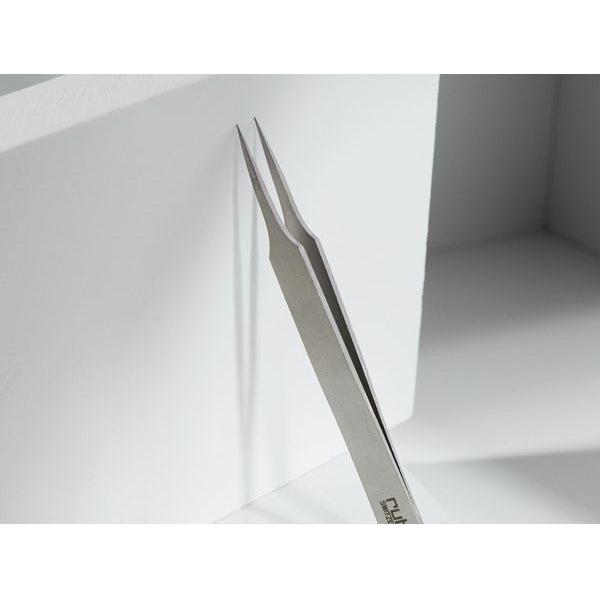 Rubis Switzerland needle nose tweezer by Pasteur Pharmacy, with precise tips for detailed grasping and precision handling.