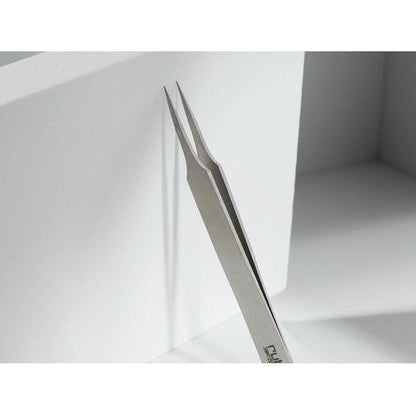 Rubis Switzerland needle nose tweezer by Pasteur Pharmacy, with precise tips for detailed grasping and precision handling.