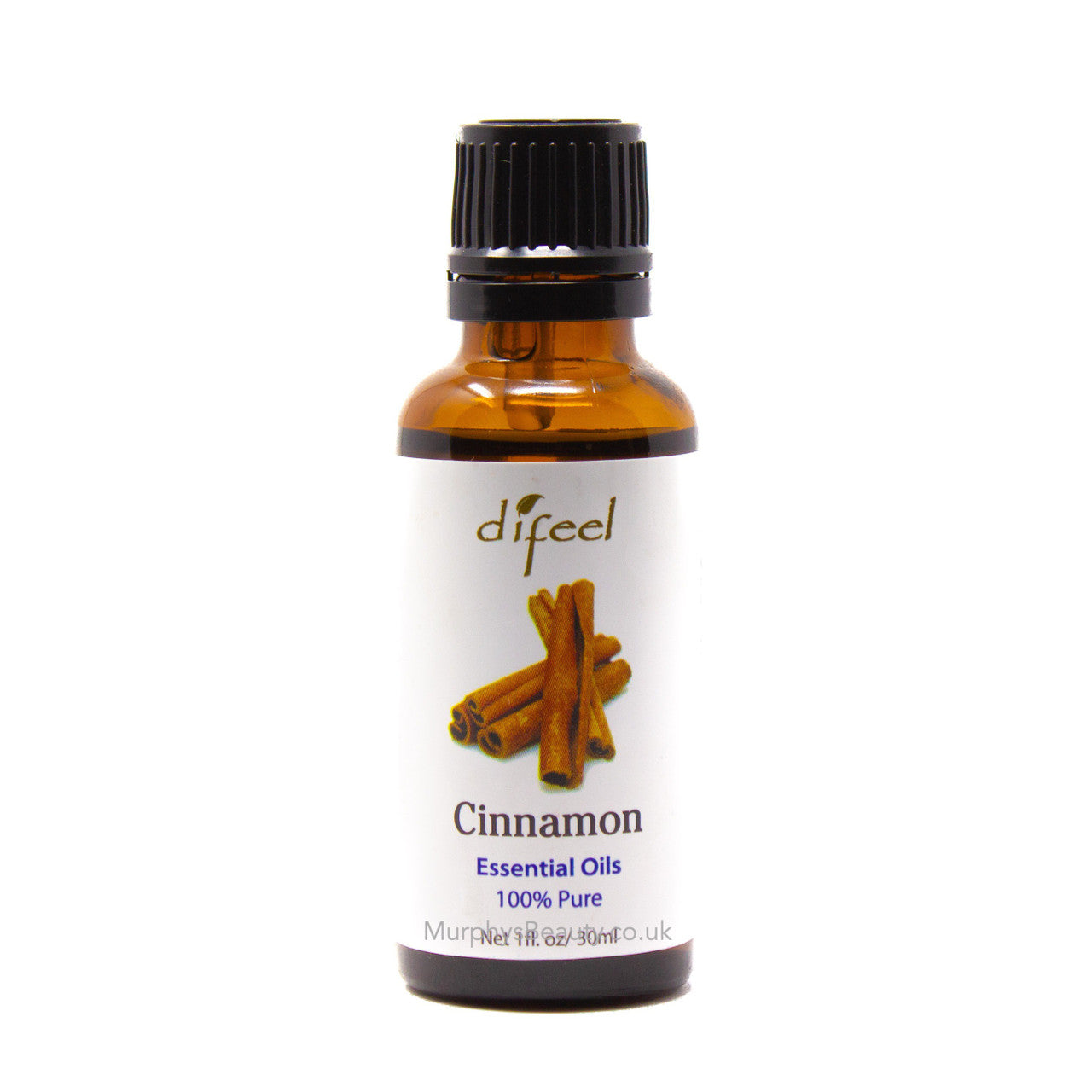 Difeel 100% pure cinnamon essential oil in a 1-ounce bottle, displayed with oil and vinegar dispensers for aromatic use.