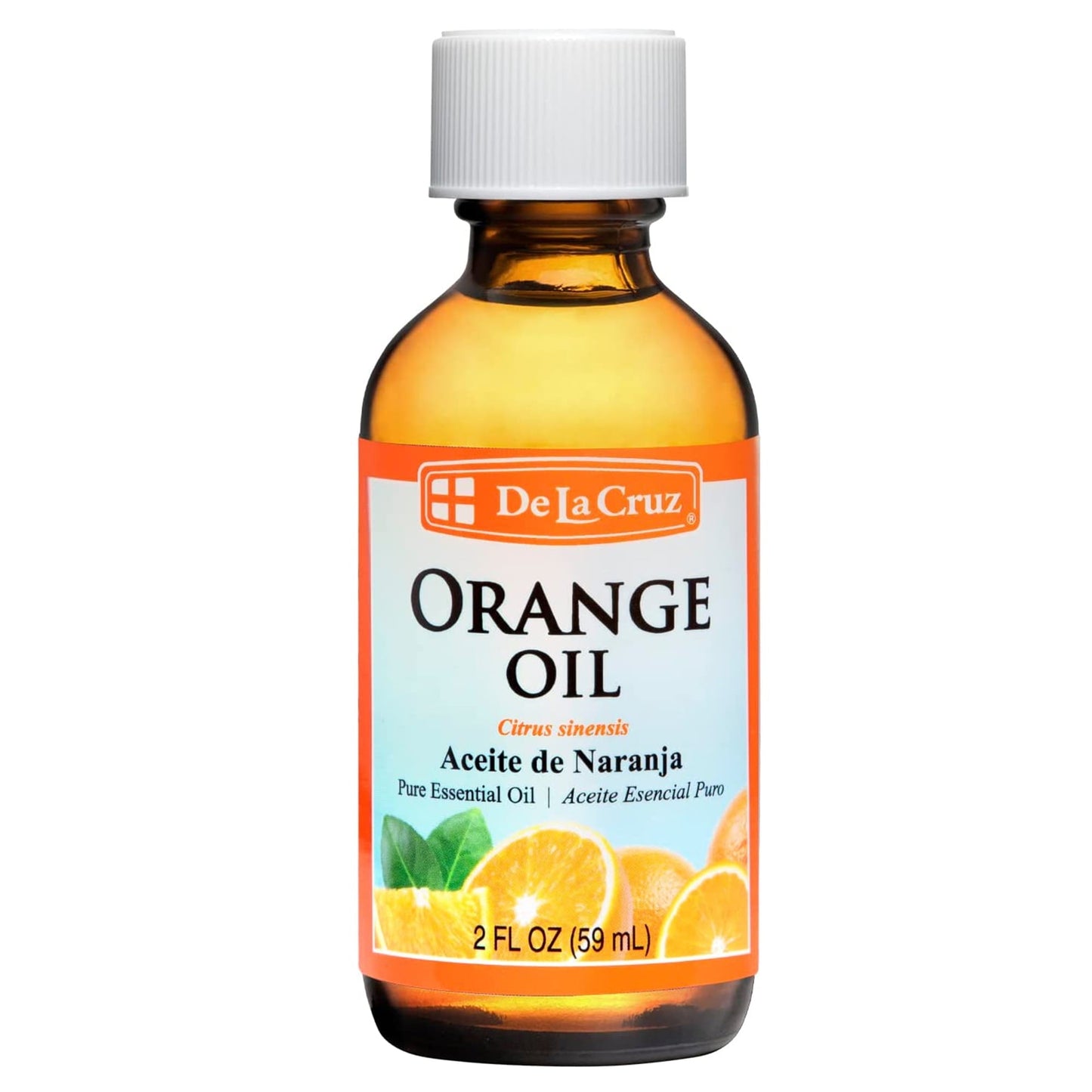 De La Cruz Pure Orange Essential Oil in a 2 fl oz bottle, displayed with oranges and diffuser setup for aromatherapy.