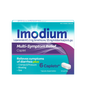 Imodium Multi-Symptom Caplets in a 6-count package, used for digestive relief, placed outdoors with natural lighting.