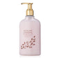 Thymes Goldleaf Gardenia perfumed body wash in a 9.25 oz bottle, featuring luxurious floral scent and elegant packaging.