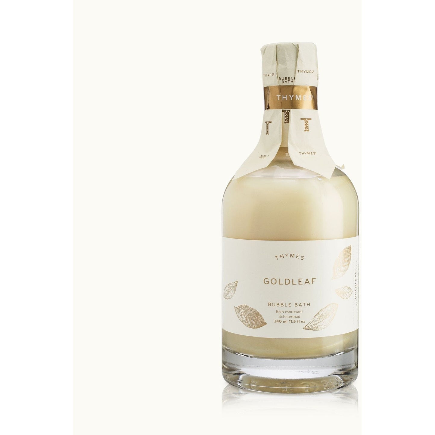 Thymes Goldleaf Perfumed Bubble Bath in 12.25 oz bottle, with luxurious golden packaging and floral scent, by Pasteur Pharmacy.
