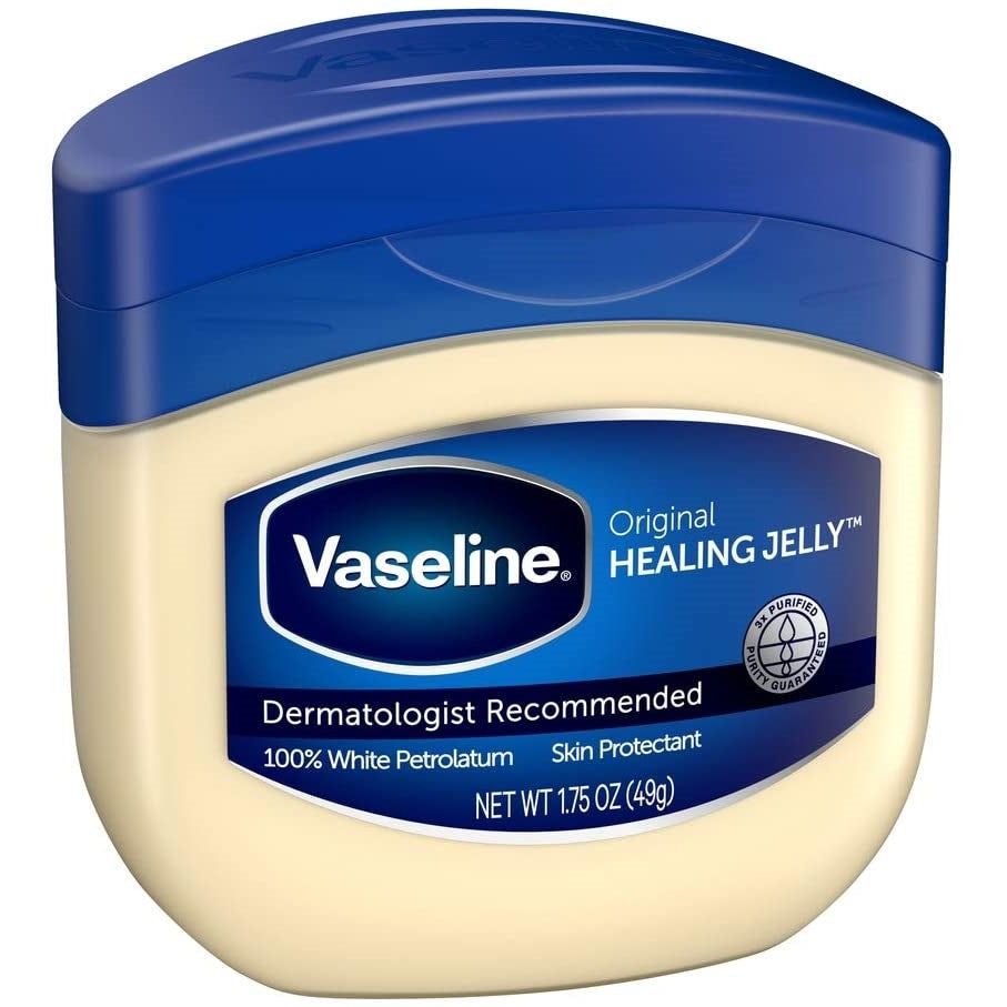 Vaseline 100% Pure Petroleum Jelly jar by Pasteur Pharmacy, 1.75 oz, showing the classic clear petroleum jelly inside the jar.