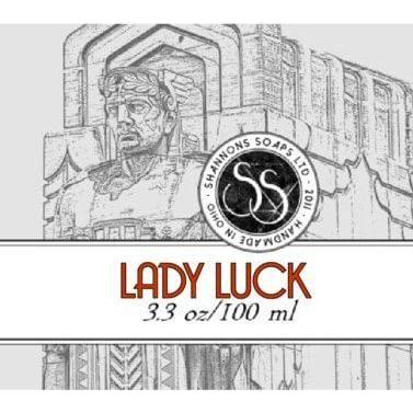 Shannons Soaps Lady Luck soothing post-shave splash in 100ml bottle, clear liquid with a simple label, displayed on a white background.