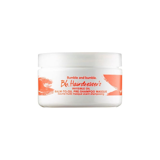 Bumble & Bumble Hairdresser's Invisible Oil Balm to Oil Pre-Shampoo Masque in a 5.8 oz jar, nourishing hair treatment.