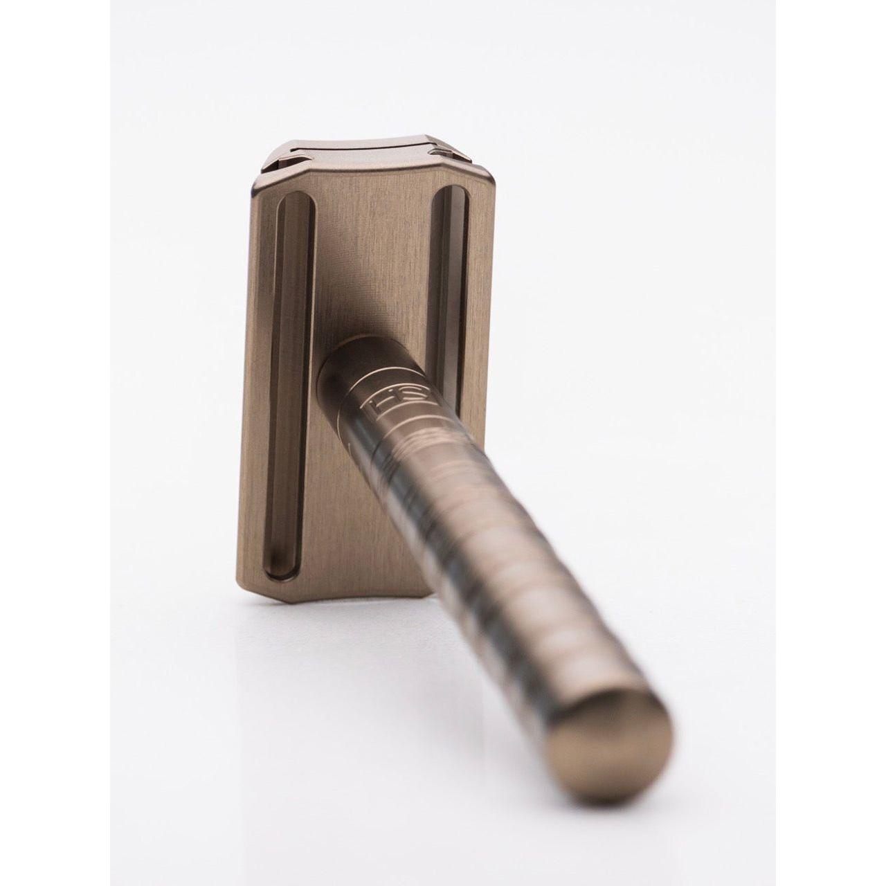 Henson Shaving AL13-V2 medium safety razor with aircraft-grade aluminum handle, designed for a smooth shave.