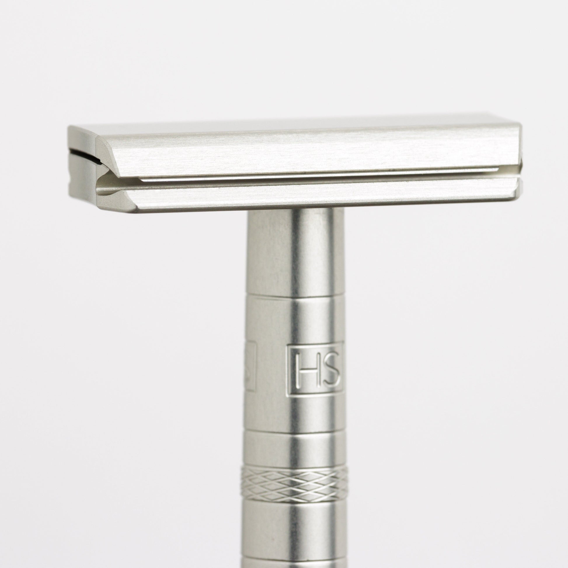 Henson Shaving AL13-V2 medium safety razor with aircraft aluminum handle, designed for a smooth, close shave.
