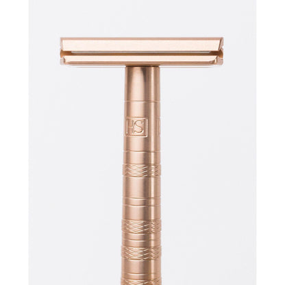 Light gray Henson Shaving AL13-V2 Mild Safety Razor with aircraft aluminum handle, designed for a smooth shave.