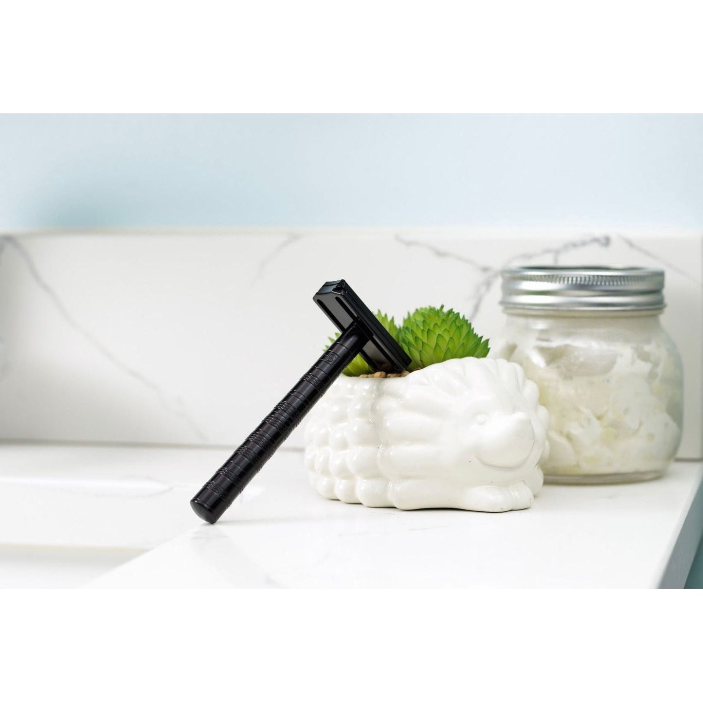 Henson Shaving AL13-V2 mild safety razor with aircraft aluminum handle, designed for smooth, precise shaving.