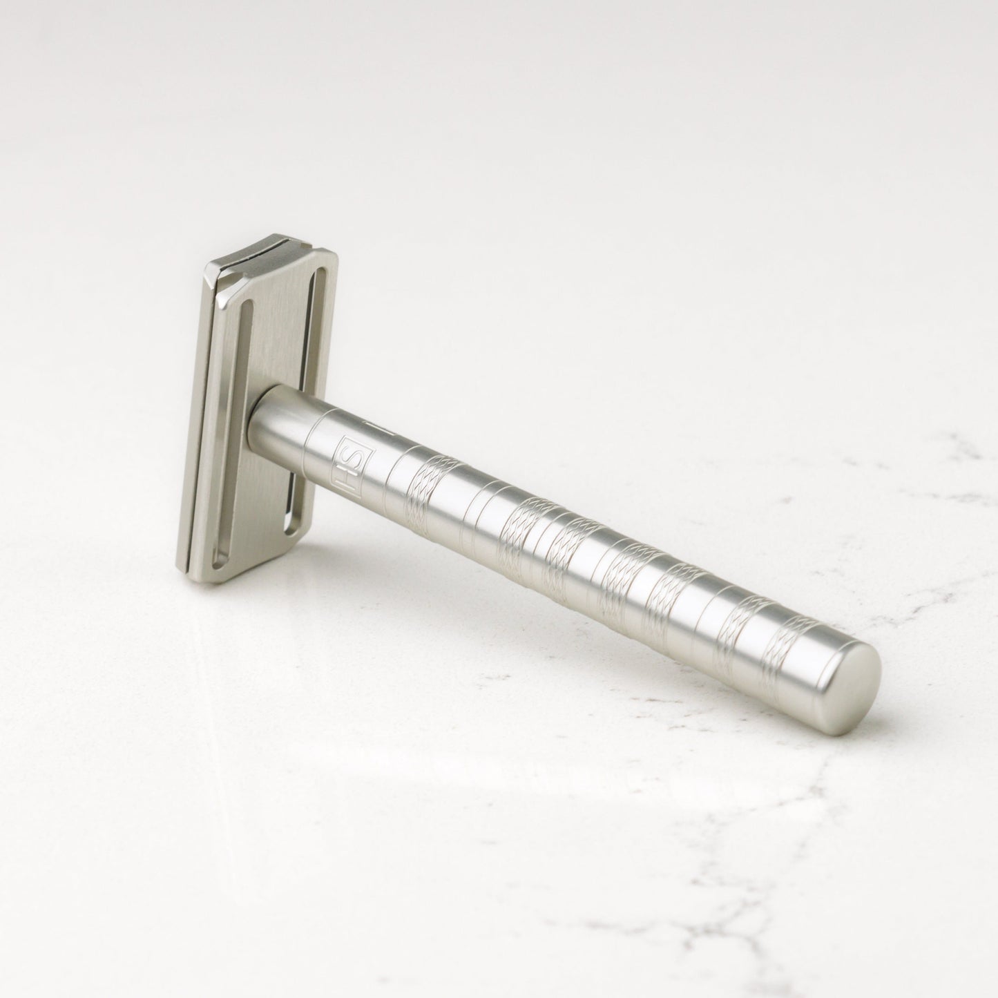 Henson Shaving AL13-V2 mild safety razor with aircraft aluminum handle, designed for a smooth, comfortable shave.