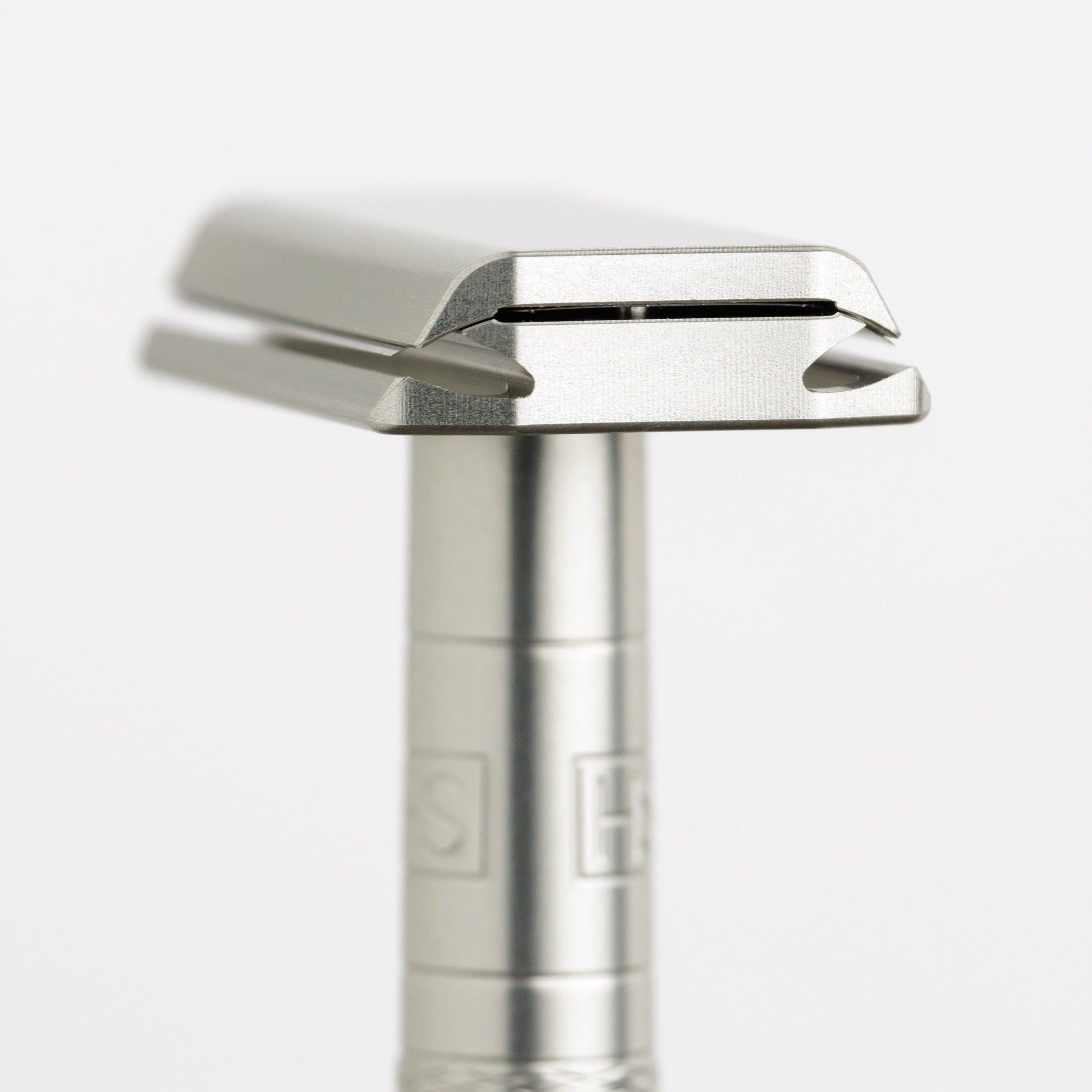 Henson Shaving AL13-V2 mild safety razor with aircraft aluminum handle, designed for smooth, comfortable shaving.