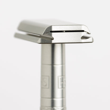 Henson Shaving AL13-V2 mild safety razor with aircraft aluminum handle, designed for smooth, comfortable shaving.
