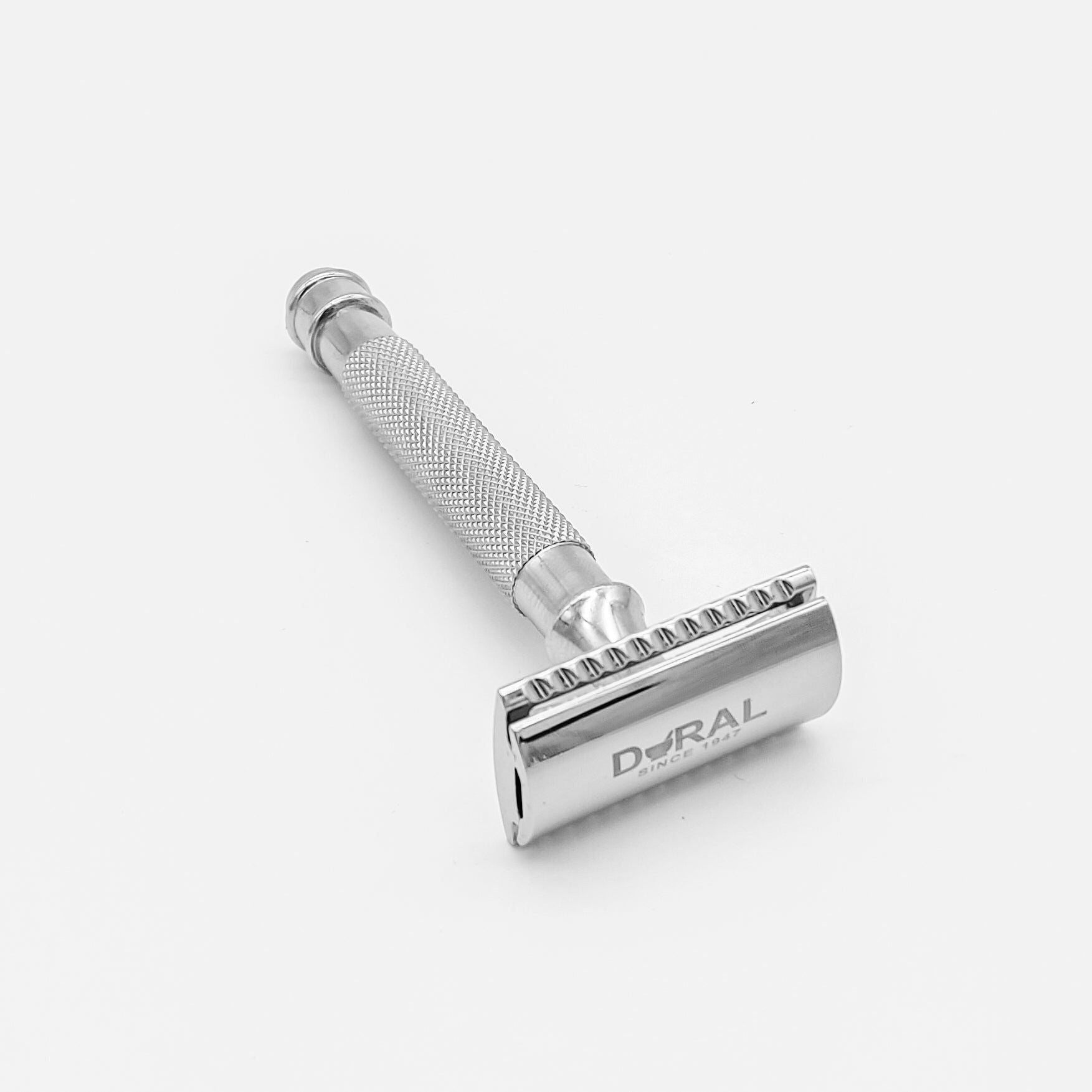 Chrome double-edge safety razor with a pouch by Dural Eyan, featuring a sleek design and safety guard for a close shave.