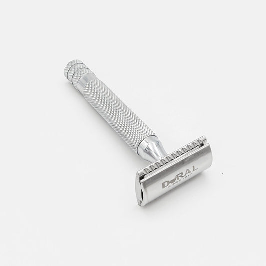 Dural HD Model double edge safety razor with a black handle and safety guard, placed next to a black pouch for storage.