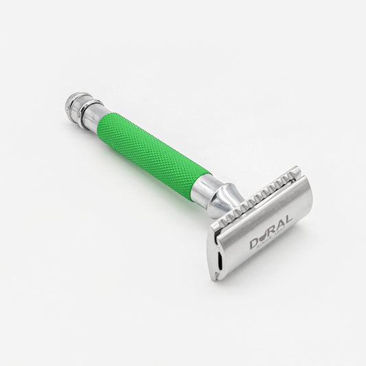 Dural Heavy Stroud Head safety razor by Pasteur Pharmacy with green and silver finish, shown with a pouch for storage.