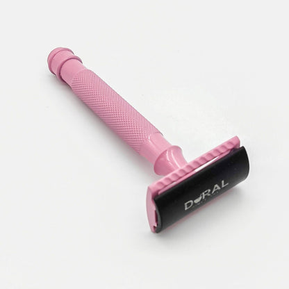 Dural Heavy Stroud Head safety razor by Pasteur Pharmacy with pink and black design, shown with protective pouch.