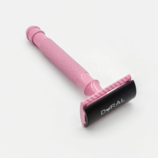Dural Heavy Stroud Head safety razor by Pasteur Pharmacy with pink and black design, shown with protective pouch.