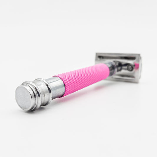 Dural Heavy Stroud Head double-edge safety razor by Pasteur Pharmacy with pink and silver finish and matching pouch.