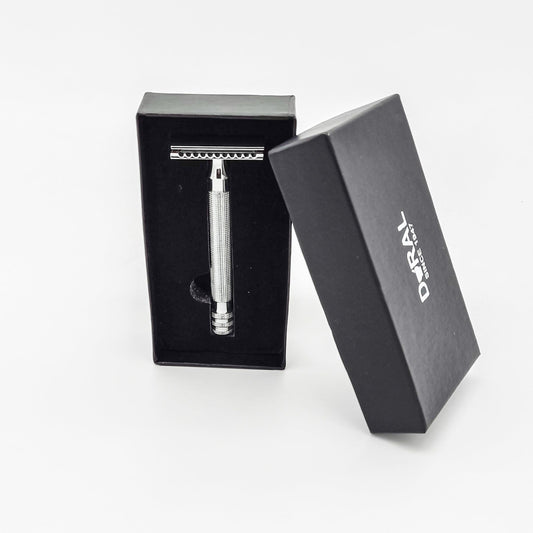Dural Ransey double edge safety razor with protective pouch by Pasteur Pharmacy, featuring a sleek metal handle and classic design.