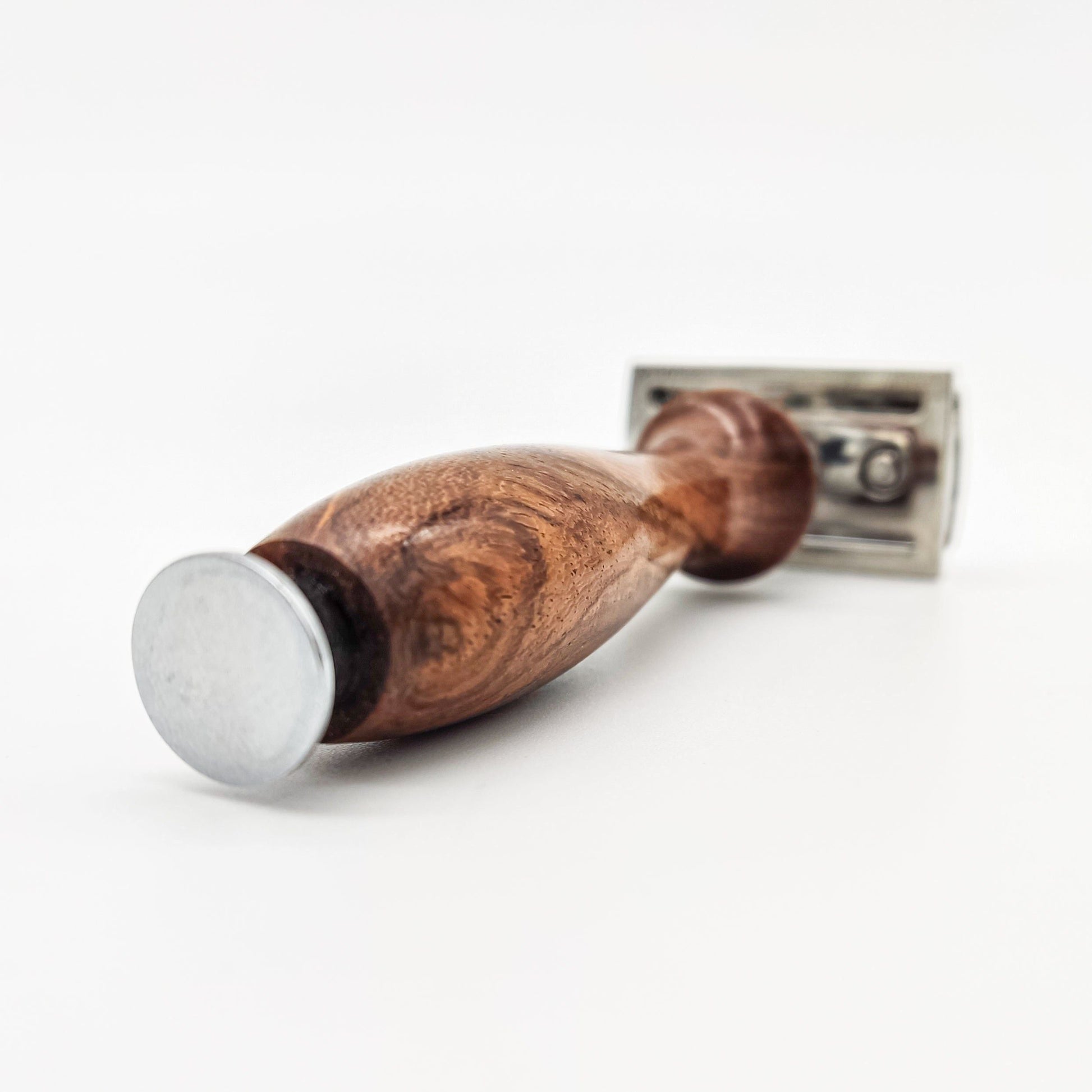 Dural Sheesham wood double-edge safety razor with protective pouch, featuring a sleek, handcrafted design from Pasteur Pharmacy.