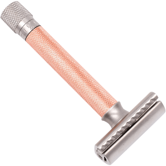 Parker Variant adjustable safety razor in rose gold with textured handle and adjustable head for a close shave.