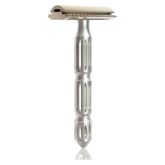 The Goodfellas Smile Safety Razor by Pasteur Pharmacy with a closed comb design, featuring a sleek metal handle and classic safety razor head.