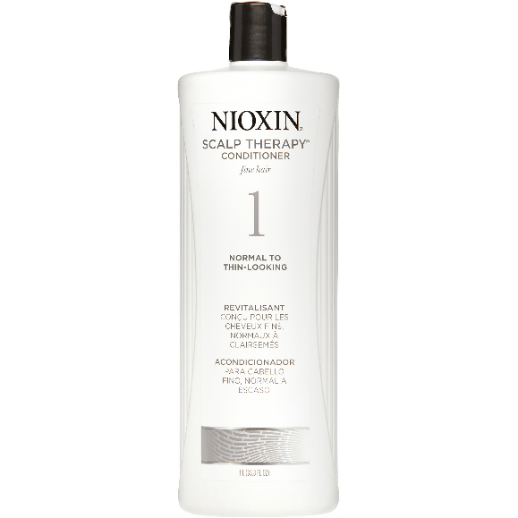 Nioxin System 1 Scalp Therapy Conditioner in a 33.8 fl oz bottle, designed to promote healthy scalp and hair.