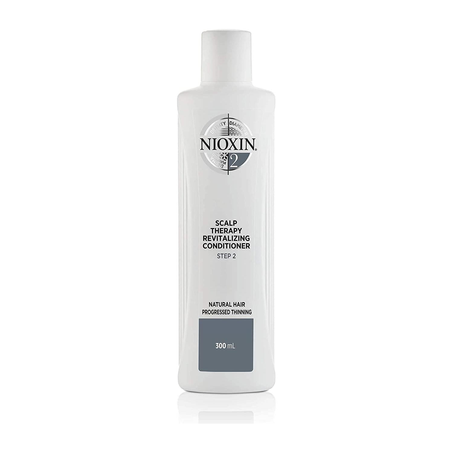 Nioxin System 2 Scalp Therapy Conditioner in a 10.1 fl oz bottle, designed to nourish and strengthen thinning hair.