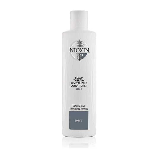 Nioxin System 2 Scalp Therapy Conditioner in a 10.1 fl oz bottle, designed to nourish and strengthen thinning hair.