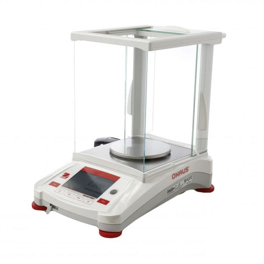OHAUS Adventurer Precision Balance in a science laboratory, weighing 2200g with 0.1g precision and external calibration.