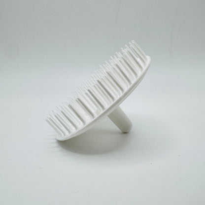 White Balloid Brosse Massage Plastic Shampoo Brush by Pasteur Pharmacy, showing the ergonomic design and bristle details.