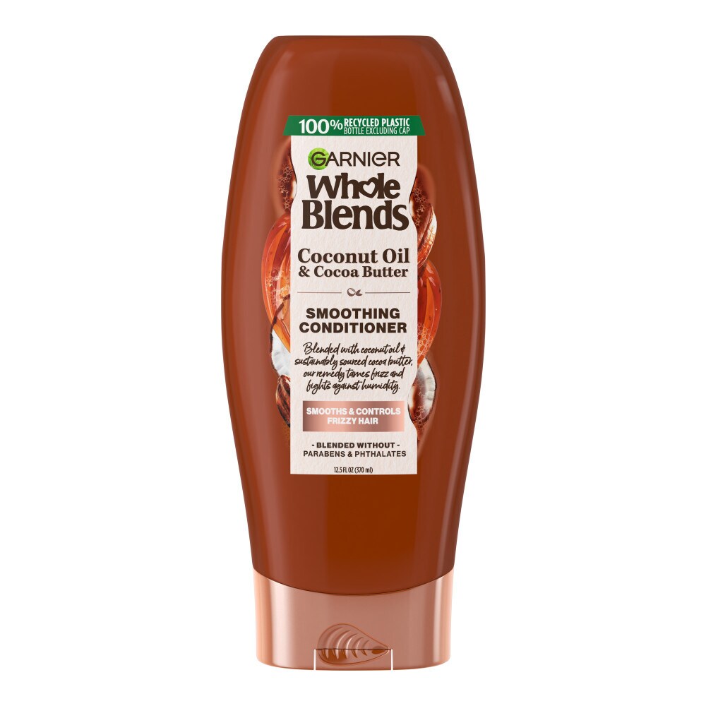 Garnier Whole Blends Smoothing Conditioner with Coconut Oil and Cocoa Butter in 12.5 fl oz bottle, for soft, smooth hair.