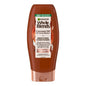 Garnier Whole Blends Smoothing Conditioner with Coconut Oil and Cocoa Butter in 12.5 fl oz bottle, for soft, smooth hair.