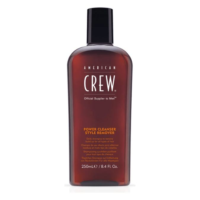 American Crew Power Cleanser Style Remover Shampoo 8.4 oz, clear glass bottle with pump dispenser, designed for hair styling product removal.