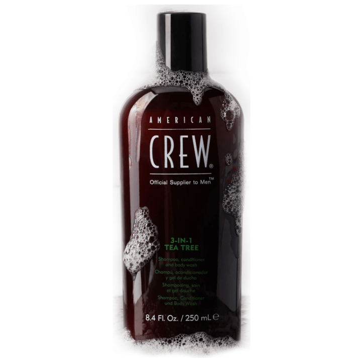 American Crew Tea Tree Shampoo moisturizing cleanser in 8.45 fl oz bottle, featuring tea tree oil for scalp and hair refreshment.
