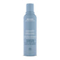 Aveda Smooth Infusion Anti-Frizz Shampoo in a 6.7 oz bottle, designed to tame frizz and smooth hair.