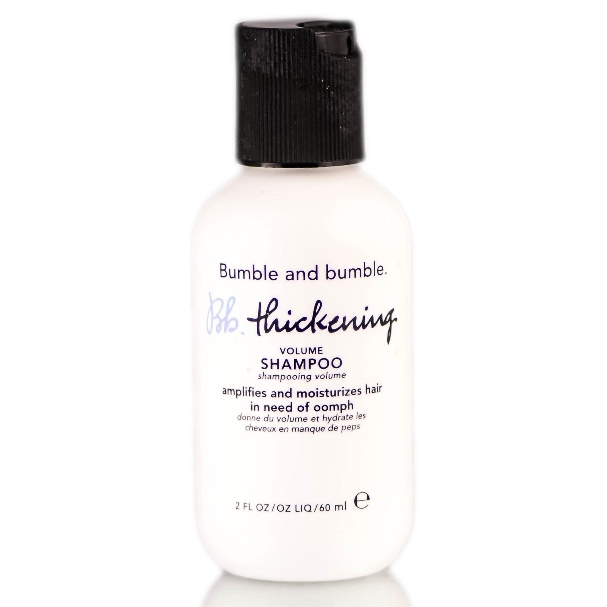 Bumble and bumble Thickening Volume Shampoo 60ml in a clear bottle with white and purple label, designed for fuller hair.