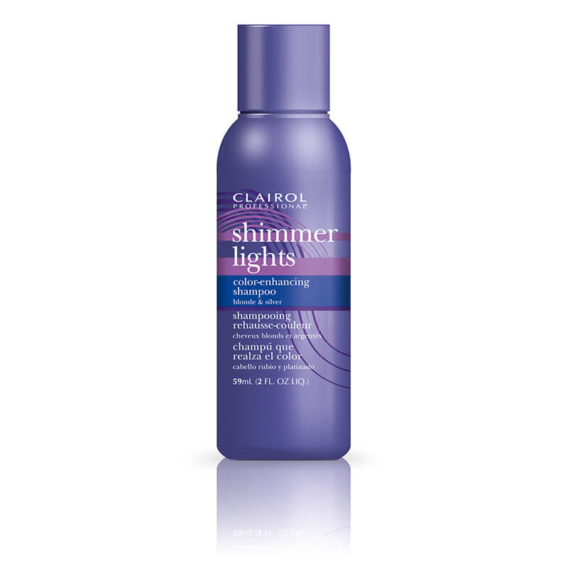 Clairol Professional Shimmer Lights Shampoo in a bottle, designed to brighten blonde and silver hair with a gentle formula.