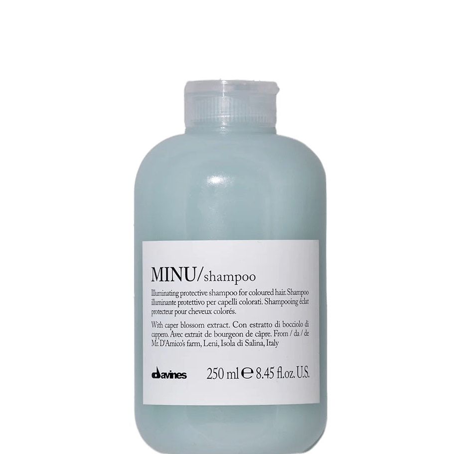 Davines Essential Haircare Minu Shampoo 250ml bottle, gentle sulfate-free shampoo for color-treated hair, displayed on a clean surface.