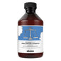 Davines Naturaltech Rebalancing Shampoo in 8.45 oz bottle, gentle hair cleanser for scalp balancing and hair health.