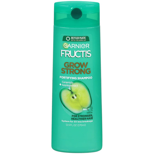 Garnier Fructis Grow Strong Shampoo in 12.5 fl oz bottle, with green and white packaging, designed to strengthen hair.