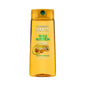 Garnier Fructis Triple Nutrition Shampoo bottle for dry to very dry hair, 22 fl oz, shown in a natural hair care setting.