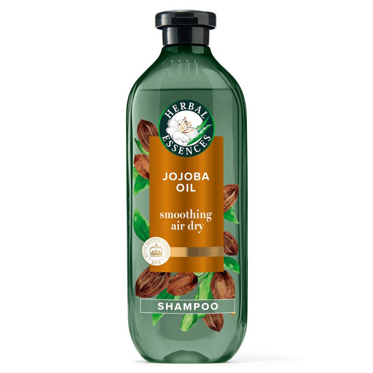 Herbal Essences Jojoba Oil sulfate-free shampoo for frizzy hair in 13.5 fl oz bottle, natural ingredients, brand label visible