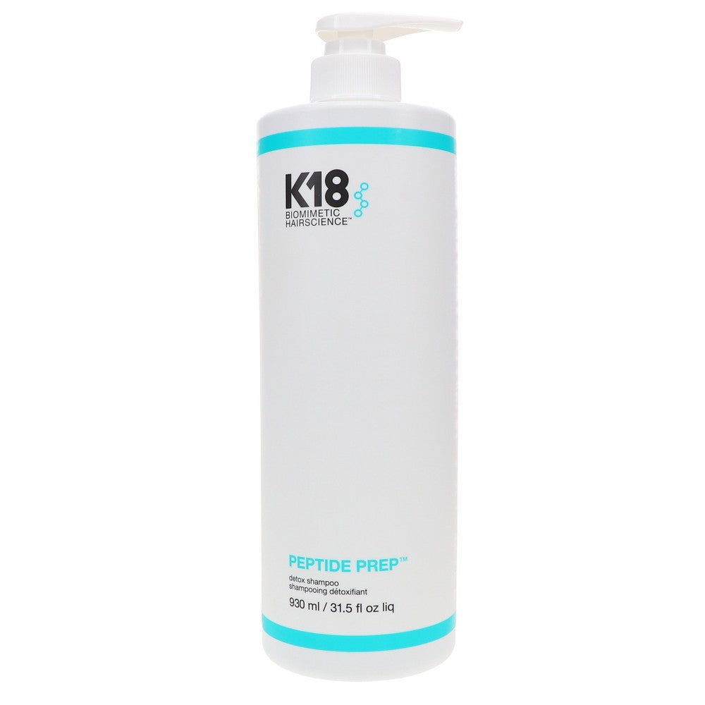 Pasteur Pharmacy K18 Peptide Prep Detox Shampoo in a 31.5 oz bottle, showing the shampoo's clear liquid and label.