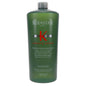 Kerastase Genesis Homme Bain De Force Quotidien Shampoo in 33.8 oz bottle, used for strengthening men's hair.