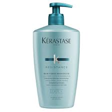 Kérastase Résistance Bain De Force shampoo in 250ml bottle, reinforcing and repairing damaged hair, natural hair texture visible.