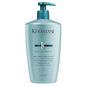 Kérastase Résistance Bain De Force shampoo in 250ml bottle, reinforcing and repairing damaged hair, natural hair texture visible.