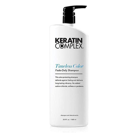 Keratin Complex Color Therapy Timeless Color Fade Defy Shampoo in 33.8 oz bottle, designed to protect and enhance color-treated hair.